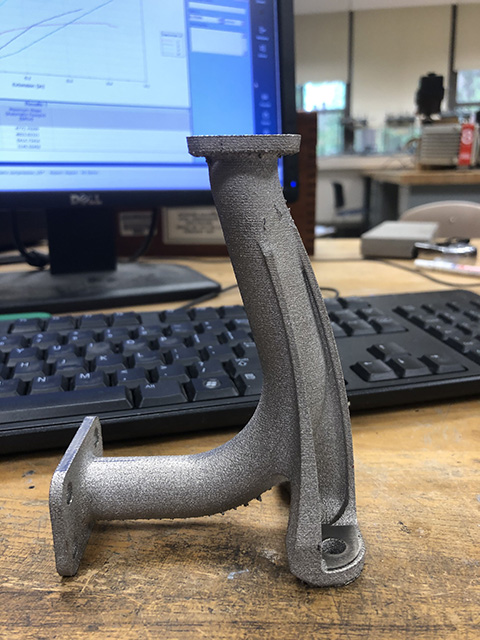 a fluid transport bracket on a desk