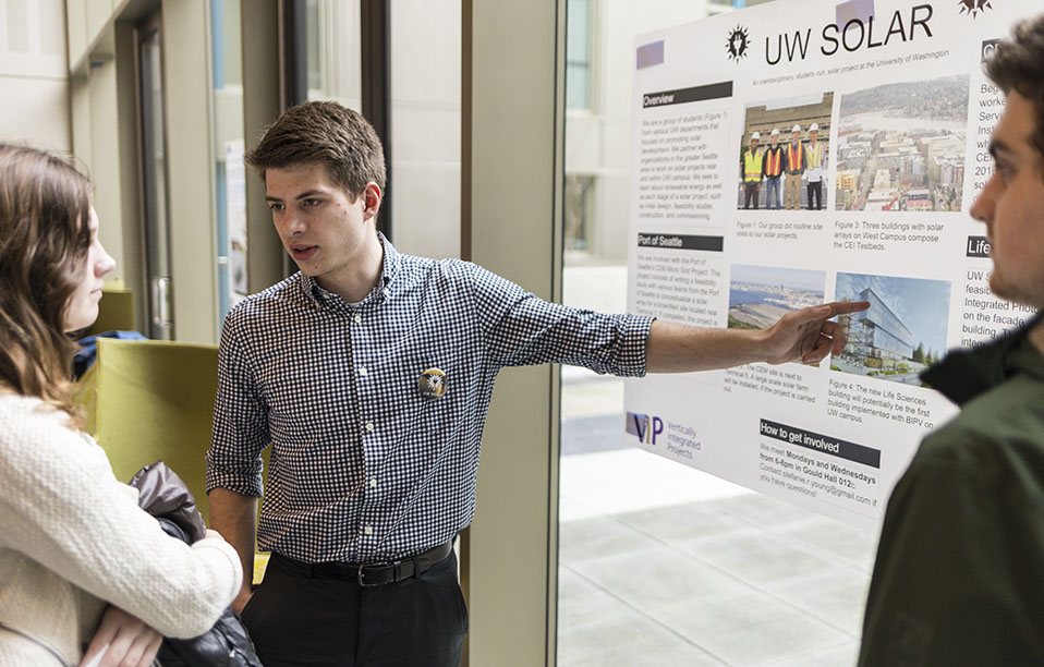 Alex Ratcliff speaks with visitors during the grand opening ceremony