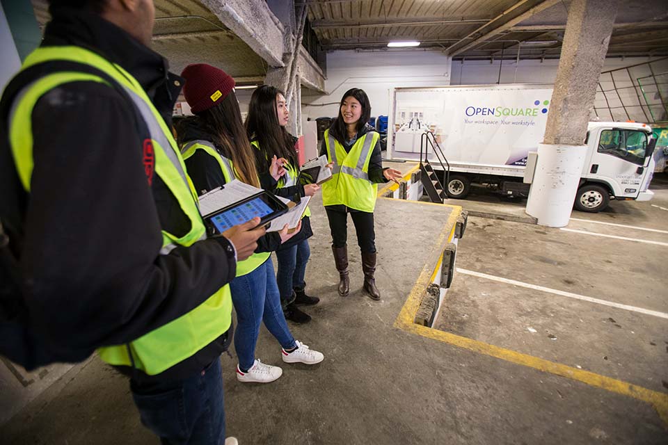 photo of team waiting for deliveries at the loading bay