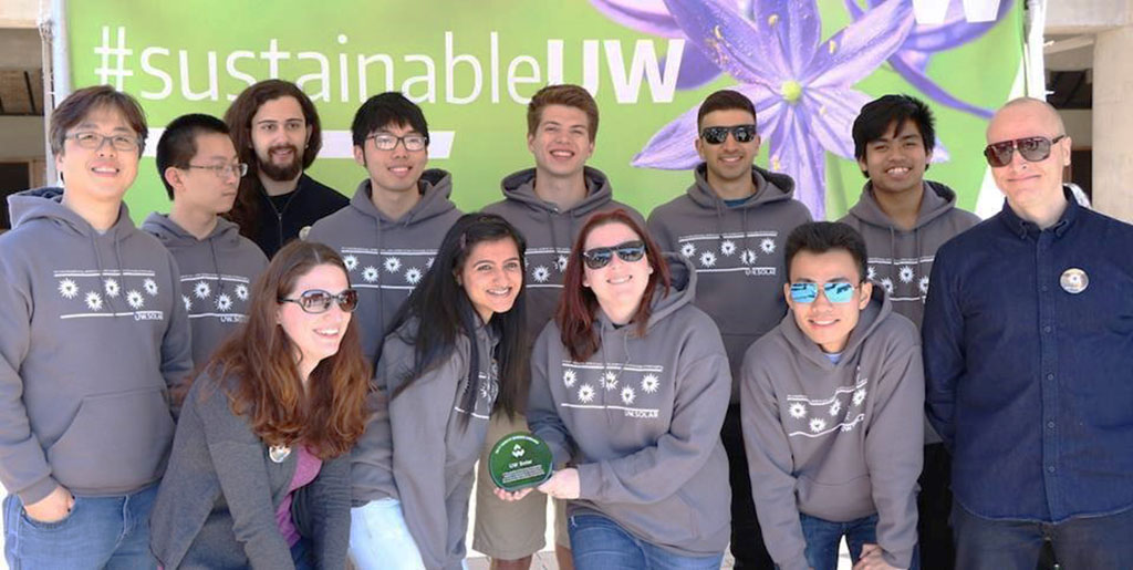 The UW Solar team accepts a Husky Green Award