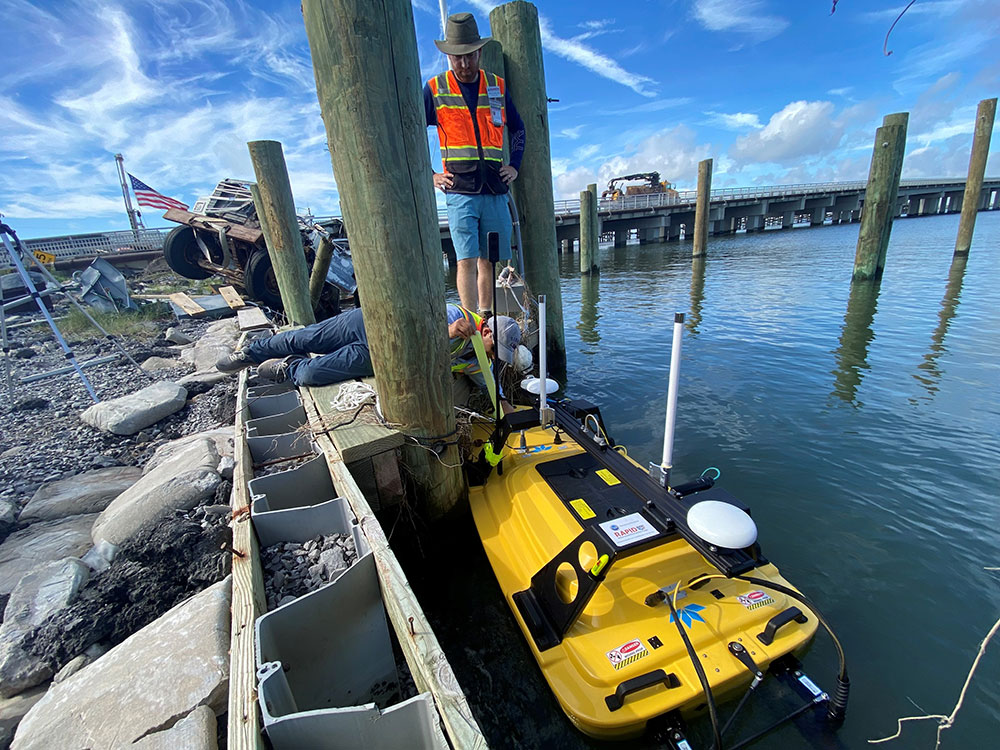 RAPID Operations Manager Michael Grilliot prepares to launch a bathometric survey vessel in the Gulf of Mexico.