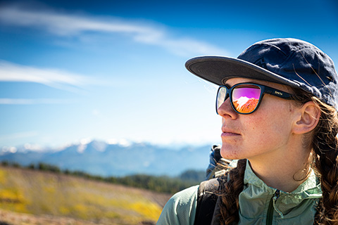 Glaciers reflected in student's sunglasses