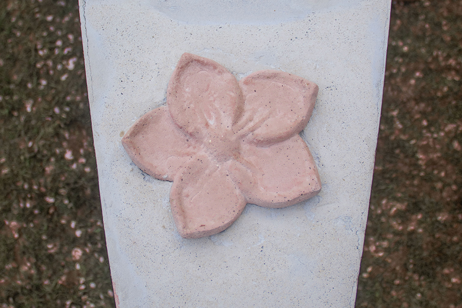 A cherry blossom that is 3D cast onto a canoe.