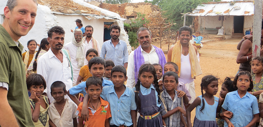 researcher with villagers