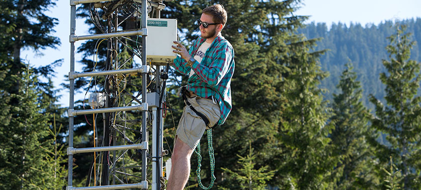 student working on tower 