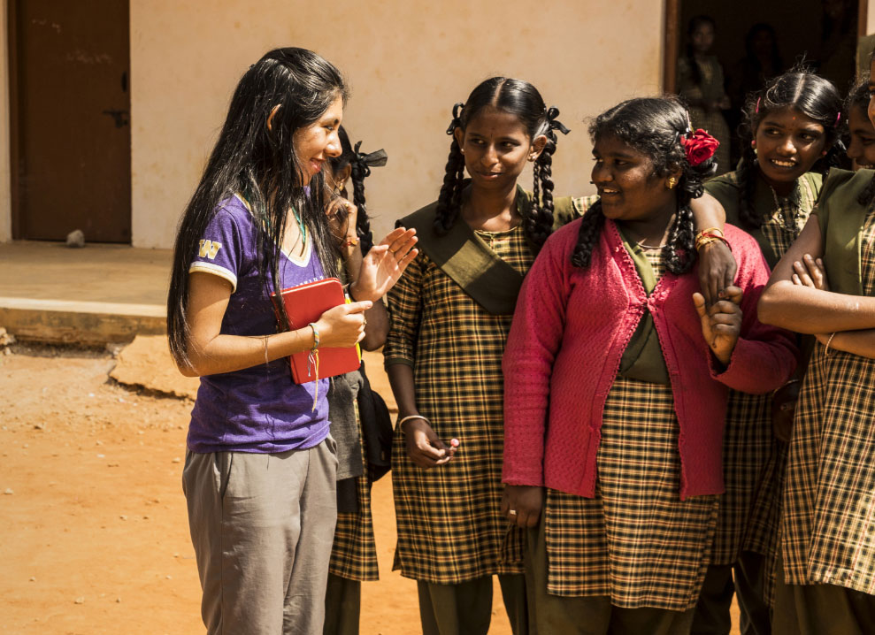 Engineering student Cristina Lopez speaking with a group of Indian students