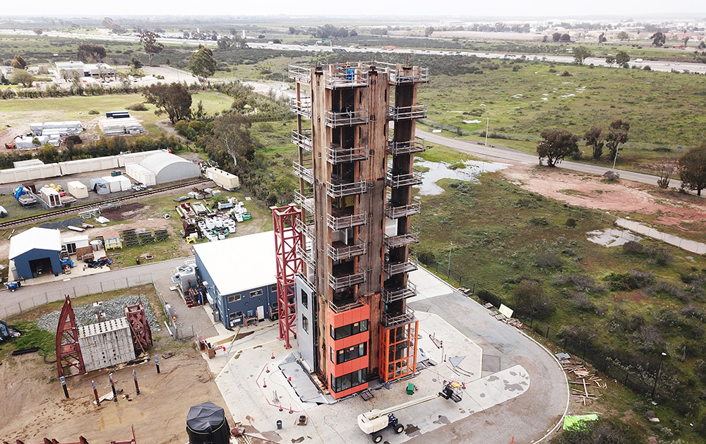 The exterior of a 10-story building constructed from mass timber