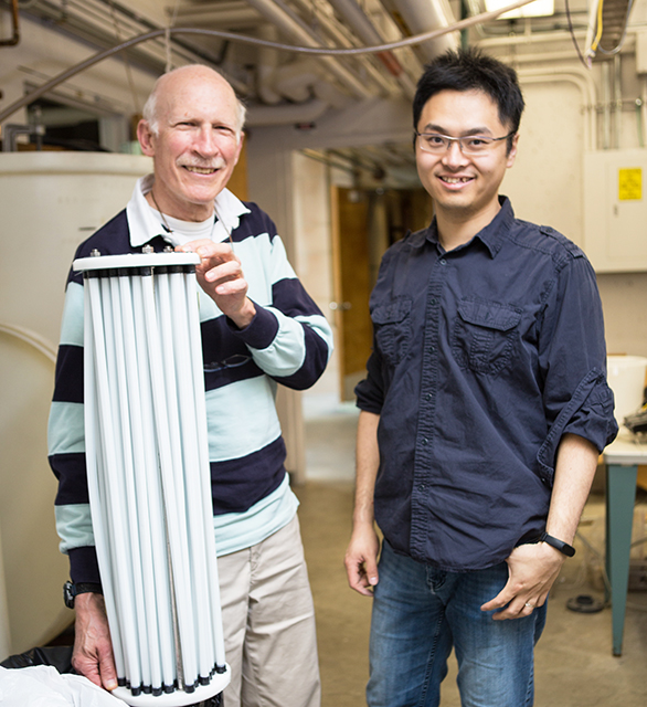 Mark Benjamin and alumnus Nathan Cai