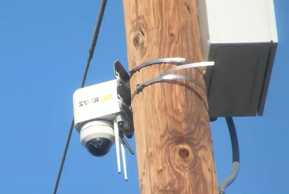 A camera pointing at a street