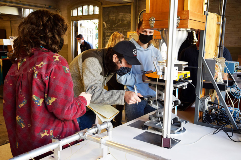 Students learn to measure the force of an air jet