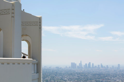 A photo of a city skyline in a haze of smog