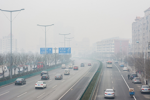 Cars on a roadway in China