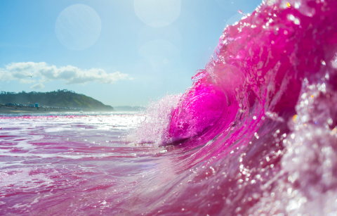 Pink dye released into water