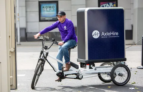 Demoing a three-wheeled electric bike