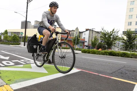 A bike riding in a bike lane.