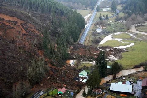 Aerial view of a 2007 landslide that damaged Washington’s State Route 6 and several structures near the town of Pe Ell.